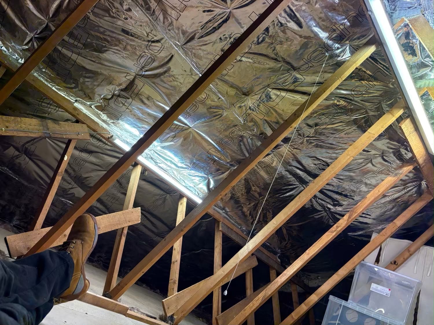 Loft insulation installation work in a UK property