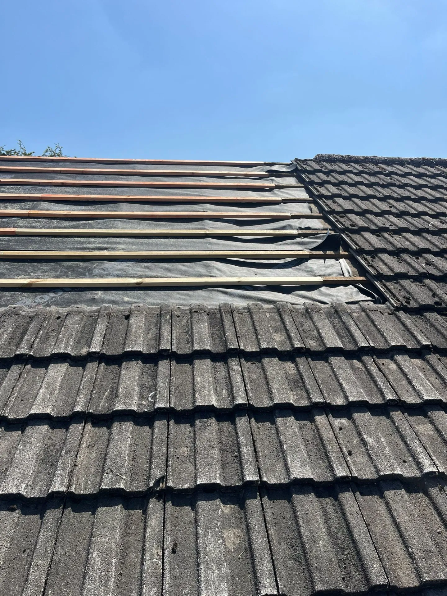 Old tiles off, breathable membrane down
