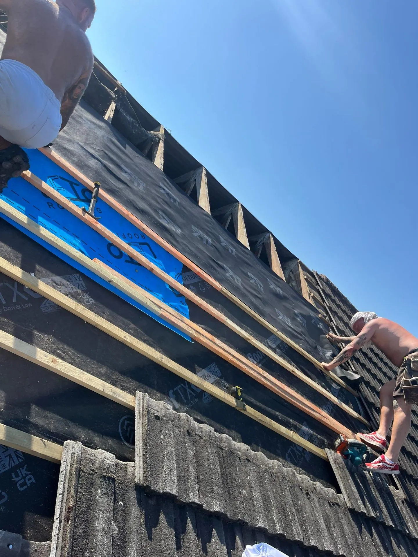 Roof repair in progress