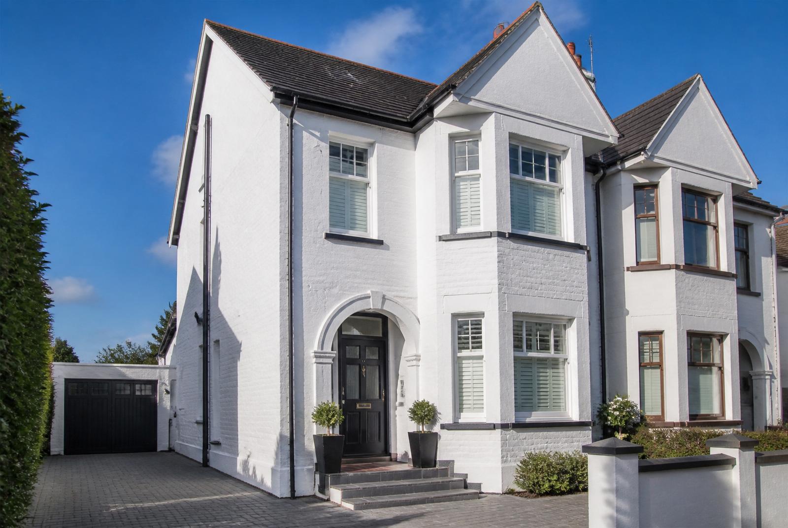 UK semi-detached home finished in white ProPerla weatherproof masonry coating